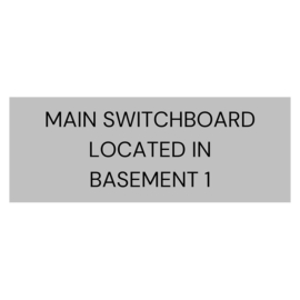 Main-Switchboard-Located-in-Basement-1-Signage